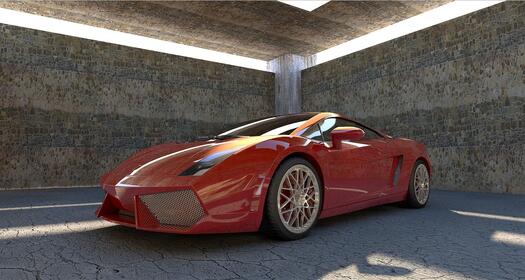 Vor grauem Beton steht in einer Ecke ein roter Lamborghini. Es ist ein Rennwagen-Modell. Foto: Piro auf Pixabay.